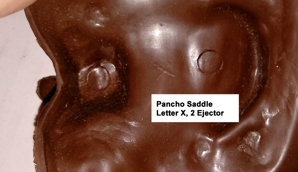 Pancho Saddle, Letter X (Hand Drawn), All Pancho saddles have 2 ejector pin marks under the Saddle. Under the Pommel and Seat.