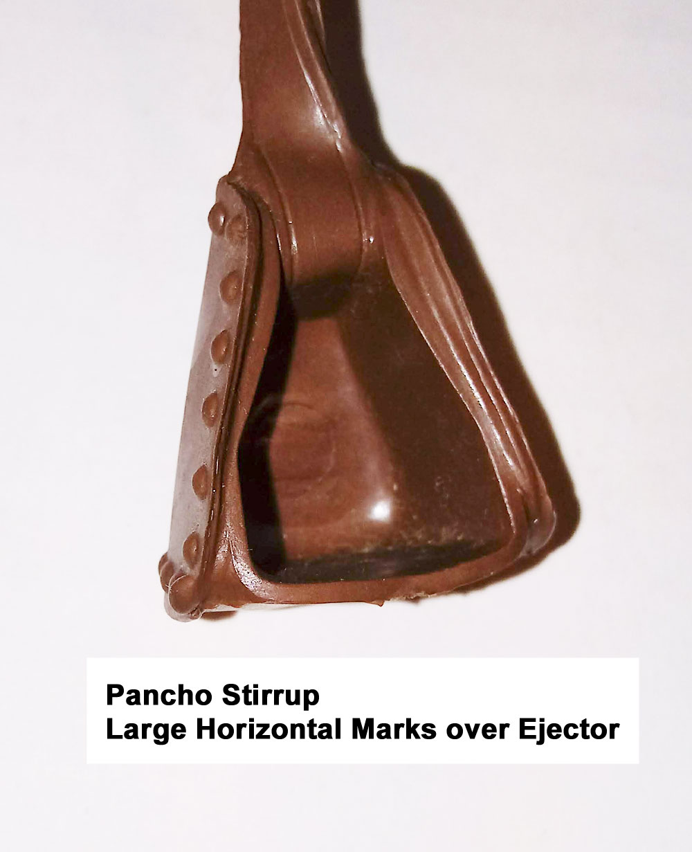 Pancho Stirrup, No Number, All Pancho Stirrups have 1 large ejector pin mark inside the stirrup. Through the Ejector pin mark you can see it is almost all covered with a Large Horizontal Mark from the left through the ejector pin circle.