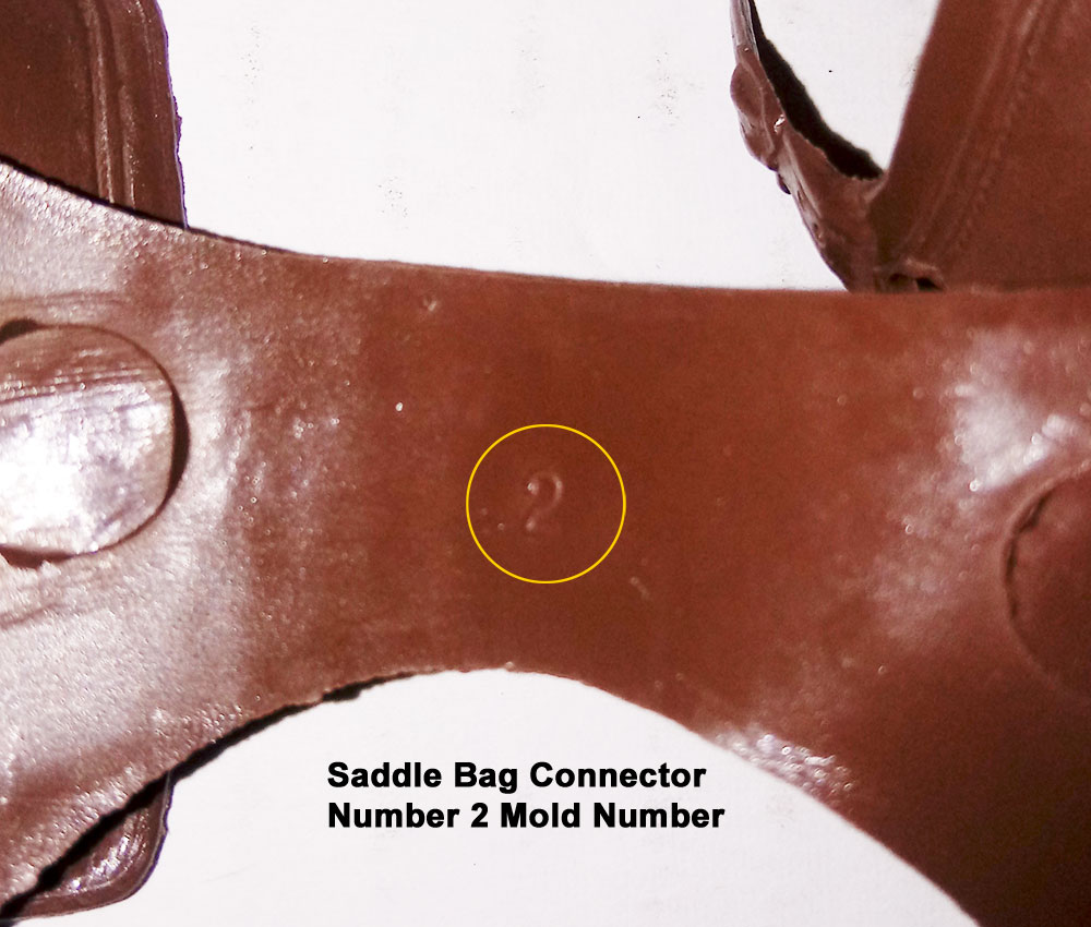 Saddle Bag Connector, Number 2, All Connector Cavities had 2 large ejector pins under the connector.