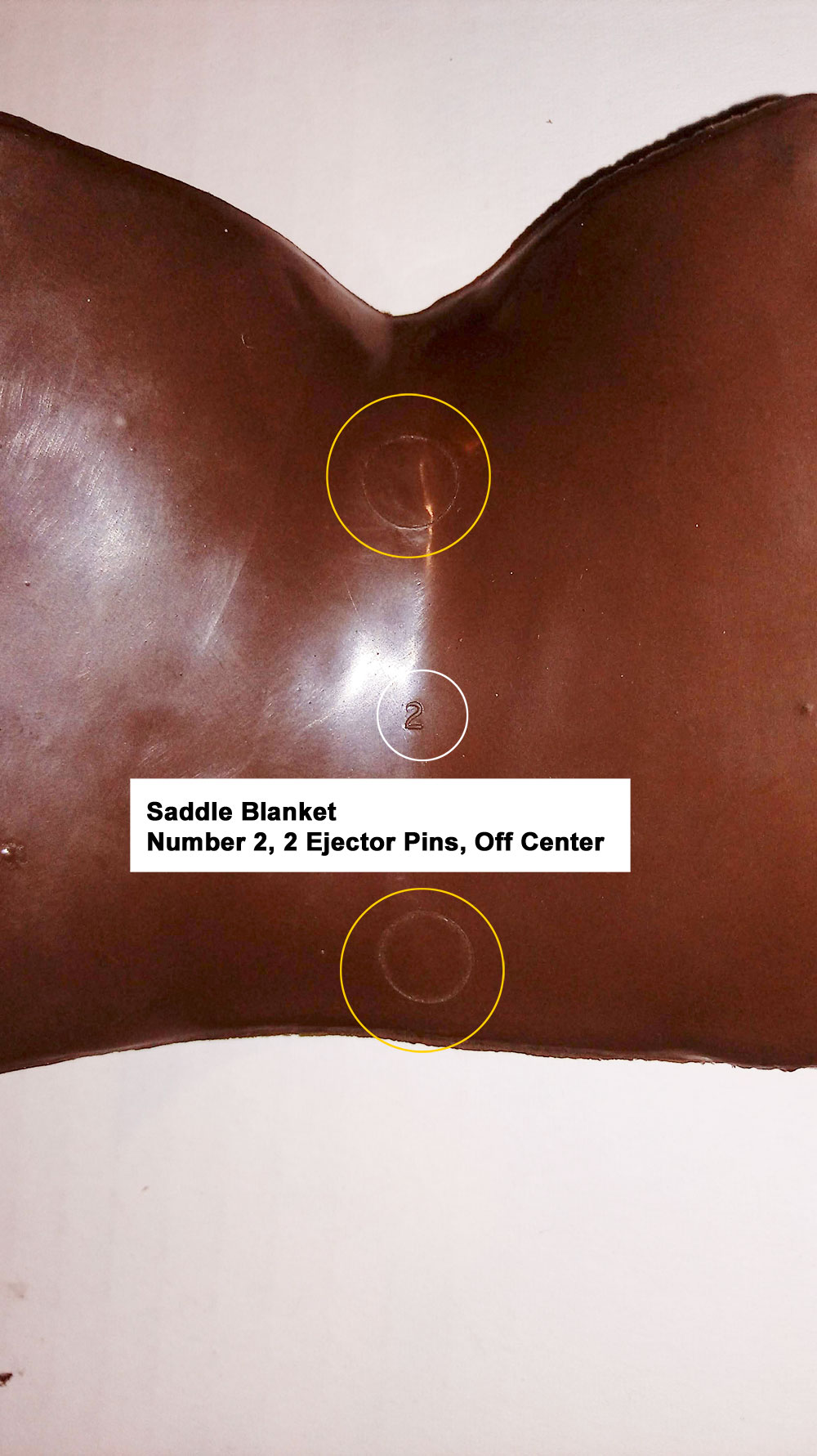 Saddle Blanket, Number 2 (small font), Cavity had 2 large ejector pins under the blanket. These are off-center (nearer the rear of the blanket).