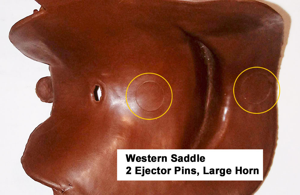 Western Saddle with large saddle horn, Not Numbered, Cavity had 2 large ejector pins under the seat and rear of the saddle.