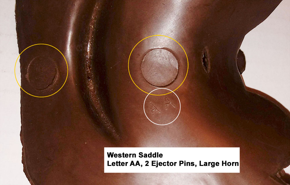 Western Saddle with large saddle horn, Lettered AA (Hand Drawn), Cavity had 2 large ejector pins under the seat and rear of the saddle.