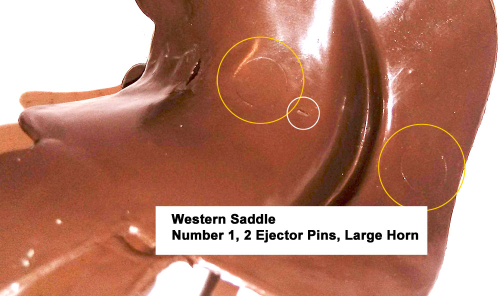 Western Saddle with large saddle horn, Number 1 (large font), Cavity had 2 large ejector pins under the seat and rear of the saddle.